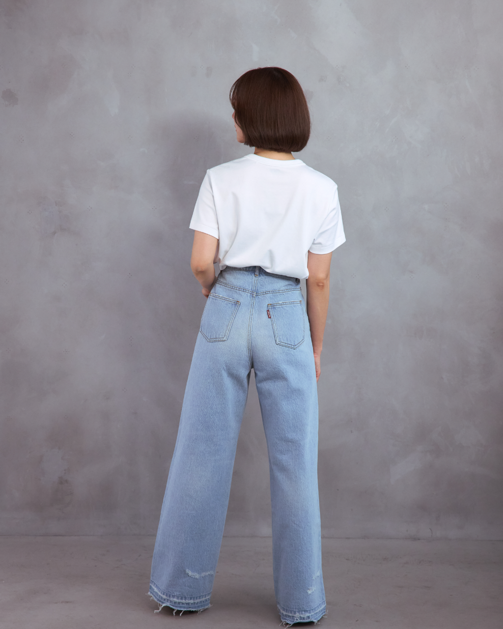 Asymmetrical straight-leg jeans