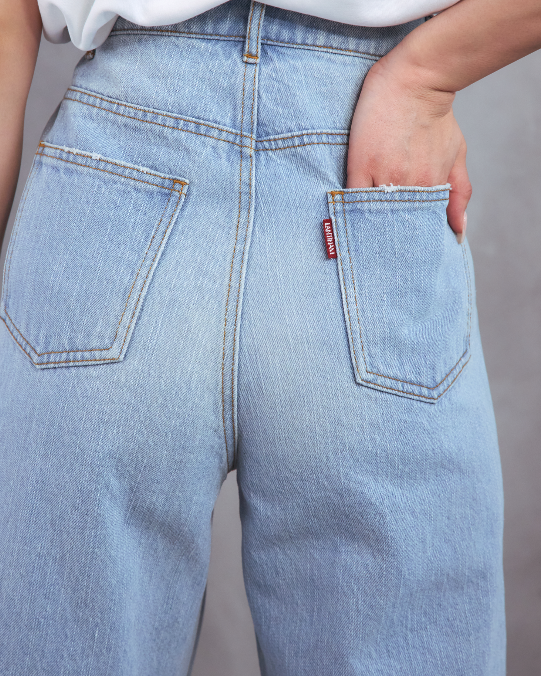 Asymmetrical straight-leg jeans